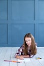 Kid drawing hobby childhood girl floor picture Royalty Free Stock Photo