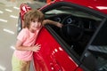 Kid Driver. Cute little boy pretending to drive. Kid in car with his hands on the wheel. Child Driver. Little kid Royalty Free Stock Photo