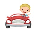 Kid drives a car. Red funny childrens automobile. Toy vehicle. With a motor. Nice passenger auto. Pedal or electric