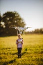 Kid with Dron in summer