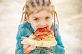 Kid eat pizza. Child eating pizza. Fastfood for kids. Italian junkfood. Children favorite food. Royalty Free Stock Photo