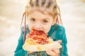 Kid eat pizza. Child eating pizza. Fastfood for kids. Italian junkfood. Children favorite food. Royalty Free Stock Photo