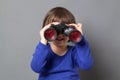 Kid exploration concept with binoculars Royalty Free Stock Photo