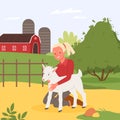 Kid and farm animal, summer holidays at village countryside, girl hugging cute baby goat Royalty Free Stock Photo