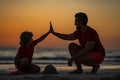 Kid and father building sandcastle. Father and son playing on the beach. Father and child son on tropical beach on