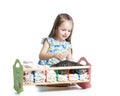 Kid feeding and playing with kitten cat Royalty Free Stock Photo