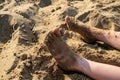 Kid feet on the beach sand. Summer beach Royalty Free Stock Photo