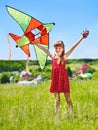 Kid flying kite outdoor. Royalty Free Stock Photo