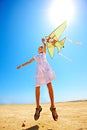 Kid flying kite outdoor. Royalty Free Stock Photo