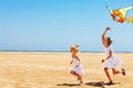 Kid flying kite outdoor. Royalty Free Stock Photo