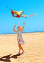 Kid flying kite outdoor. Royalty Free Stock Photo