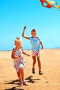 Kid flying kite outdoor. Royalty Free Stock Photo