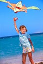 Kid flying kite outdoor Royalty Free Stock Photo