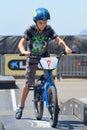 A kid at the FMX (Freestyle Motocross) junior competition