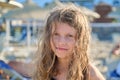 Kid girl on the beach, portrait of child on sea vacation Royalty Free Stock Photo