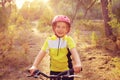 Kid girl biker in mountain bike MTB