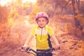 Kid girl biker in mountain bike MTB