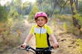 Kid girl biker in mountain bike MTB