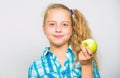 Kid girl eat green apple fruit. Vitamin nutrition concept. Reasons eat apple every day. Nutritional content of apple