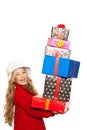 Kid girl holding many gifts stacked on her hand Royalty Free Stock Photo