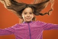Kid girl long healthy shiny hair. Little girl grow long hair. Teaching child healthy hair care habits. Strong hair Royalty Free Stock Photo