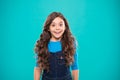 Kid girl long healthy shiny hair wear casual clothes. Little girl excited happy face. Kid happy cute face feels excited Royalty Free Stock Photo