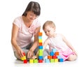 Kid girl and mom play with building blocks Royalty Free Stock Photo