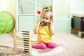 Kid girl playing with abacus, early learning Royalty Free Stock Photo