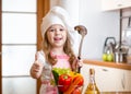 Kid girl preparing healthy food Royalty Free Stock Photo