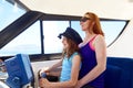 Kid girl pretending be a sailor with her mother Royalty Free Stock Photo