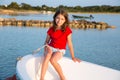 Kid girl pretending to be sailor in boat bow at Formentera Royalty Free Stock Photo