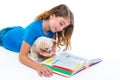 Kid girl with puppy chihuahua pet dog at homework Royalty Free Stock Photo