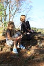 Kid - girl putting on socks and shoes Royalty Free Stock Photo