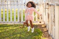 Kid girl toddler playing jumping in park outdoor Royalty Free Stock Photo