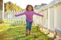 Kid girl toddler playing running in park outdoor Royalty Free Stock Photo