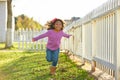 Kid girl toddler playing running in park outdoor Royalty Free Stock Photo