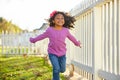 Kid girl toddler playing running in park outdoor