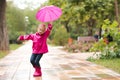 Kid girl with umbrella Royalty Free Stock Photo