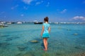 Kid girl walking at Formetera in Estany des Peix