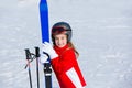 Kid girl winter snow with ski equipment Royalty Free Stock Photo