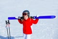 Kid girl winter snow with ski equipment Royalty Free Stock Photo