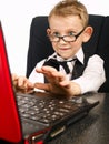Kid in glasses and laptop Royalty Free Stock Photo