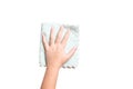 Kid hand cleaning spot from surface with table wipes isolated o