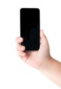 Kid Hand holding mobile smart phone with blank screen. Royalty Free Stock Photo