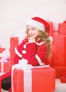 Kid happy with christmas present. Santa bring her gift. Unpacking christmas gift. Happy new year concept. Winter holiday