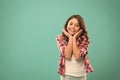 Kid happy cute face with adorable curly hair stand over blue background. Pure beauty. Beauty tips for tidy hair. Kid Royalty Free Stock Photo