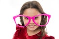 Kid happy wear cute eyeglasses accessory. Child charming smile isolated white background. Girl wear big funny eyeglasses Royalty Free Stock Photo