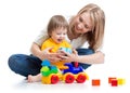 Kid with his mom play building blocks toys Royalty Free Stock Photo