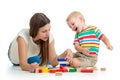 Kid and his mom play toys together Royalty Free Stock Photo