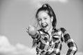 Kid hold ripe apple sunny day. Kid girl with long hair eat apple blue sky background. Healthy nutrition concept. Child Royalty Free Stock Photo